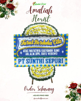 Papan Bunga Duka di Tanah Pasir